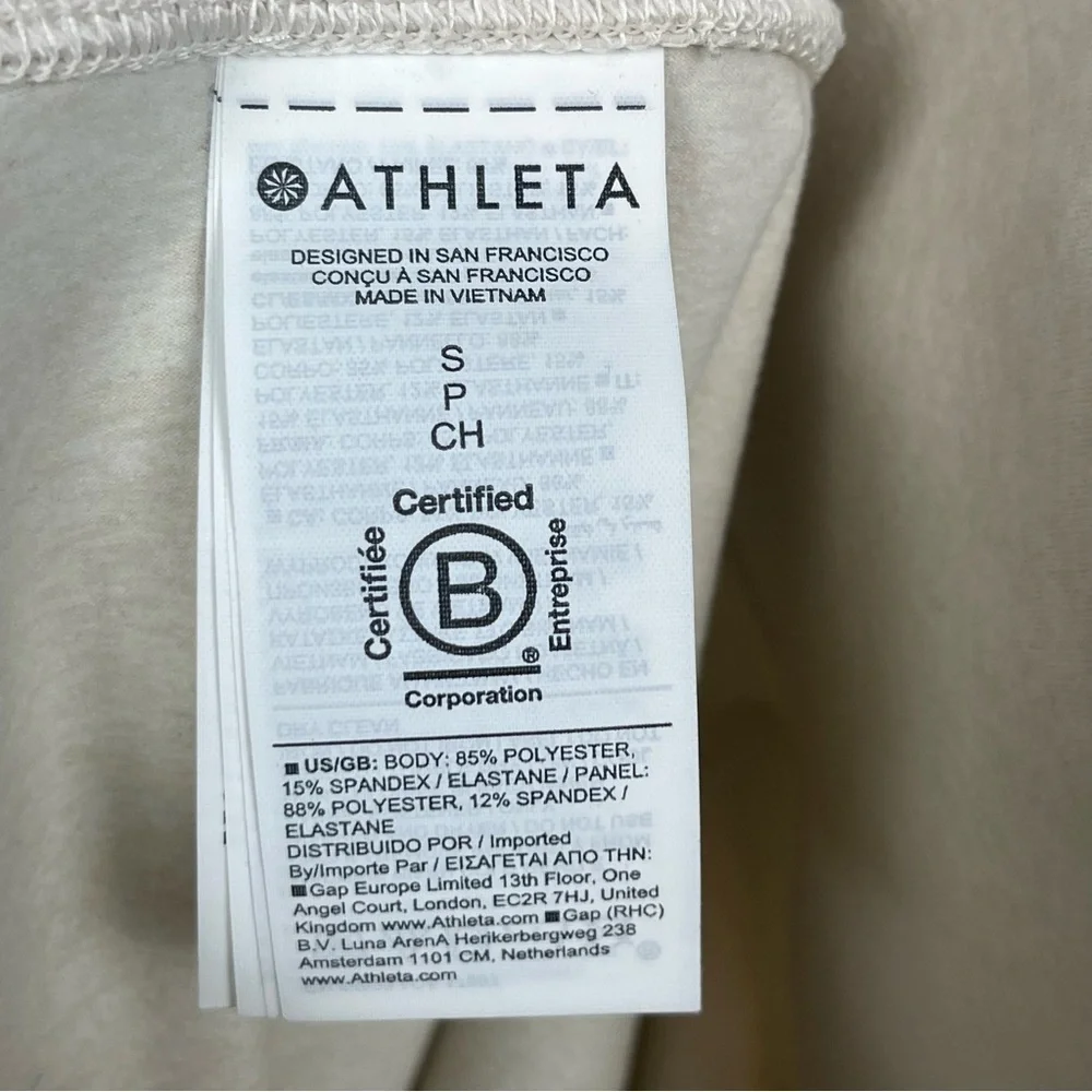 Athleta ivory oatmeal color Softluxe Cuffed Tight, size small.